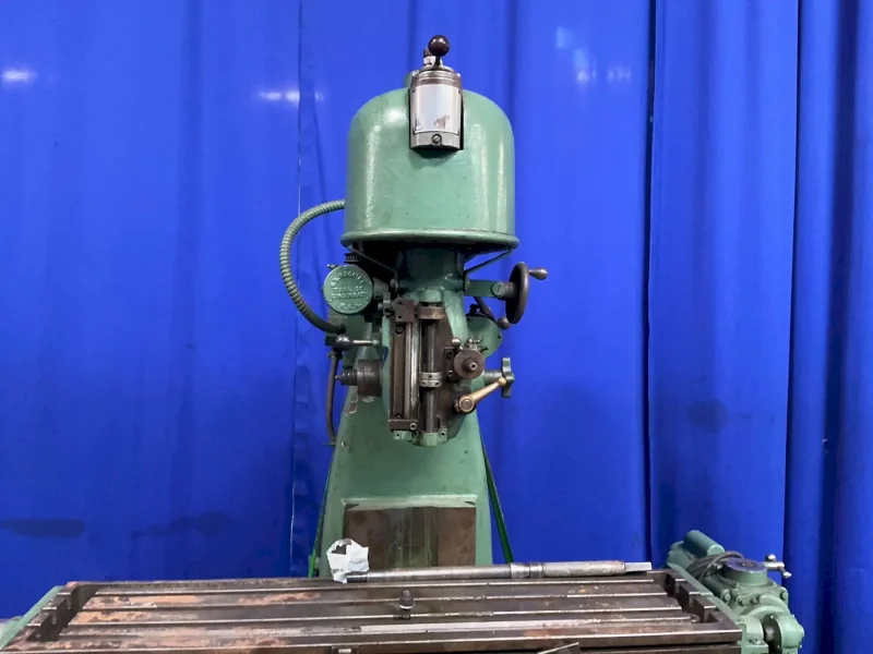 THE UNITED STATES MACHINE TOOL CO. 10”X42” VERTICAL MILL  -  V