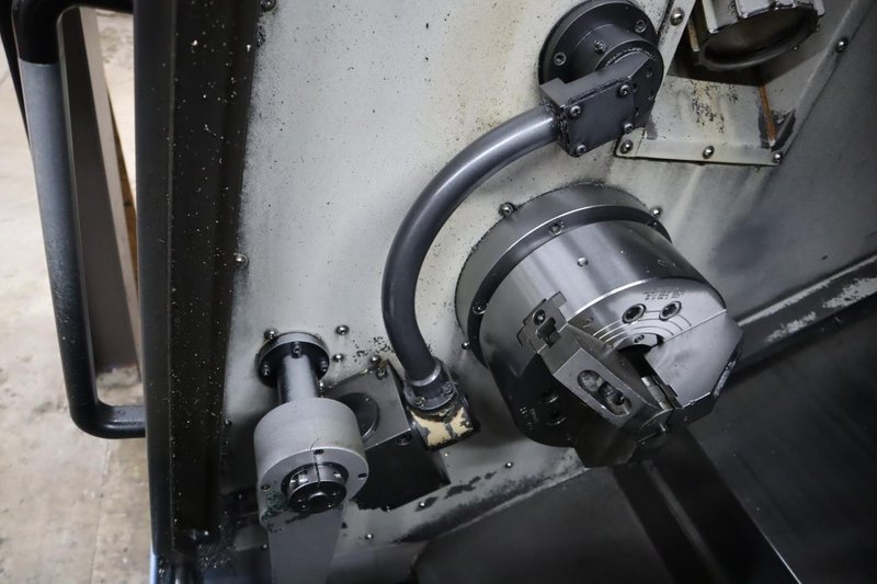 Doosan Lynx 300M CNC Turning Center with Live Milling, 12 Station Turret, 10&quot; 3-Jaw Chuck, Tailstock, Tool Presetter, Parts Catcher, Chip Conveyor- Auction Item