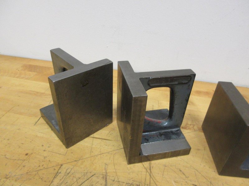 Cast Iron Angle Plates (4 pcs), (1) 4.5" x 5" x 8", (2) 3.75" x 4" x 5", (1) 4" x 4" x 4"- Auction Item
