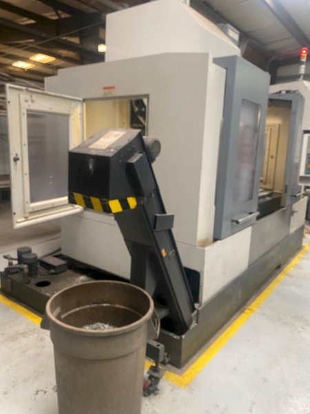 Akira Seiki Performa HV5.5A VMC, 2015 – Chip Conveyor, Mi645 Control