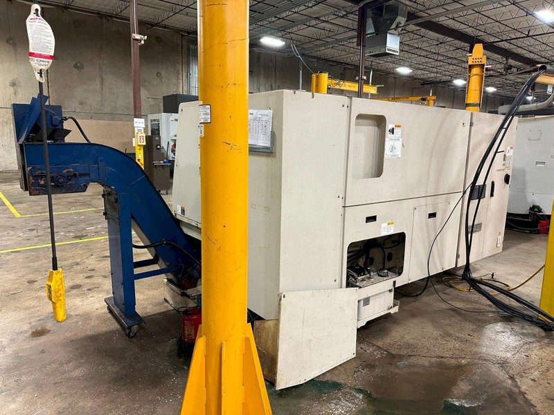 Doosan Daewoo Puma 300C CNC Lathe, 2005 – 15″ Chuck, Chip Conveyor, Programmable Tailstock