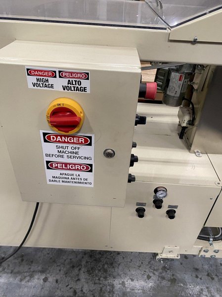 NEDCO E‑Z Fold 2000‑S Automatic Textile Folder – 1,000/hr, Bagging + Heat Seal, OEM Verified