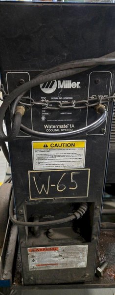MILLER DELTAWELD 452 WITH WATERMATE 1A COOLING SYSTEM AND  WIRE FEEDER USED