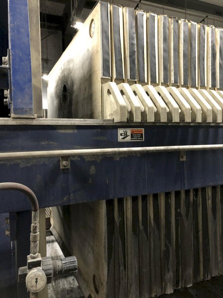 2008 Siemens model 1500n32-64/90-125/175sylc 1500 mm filter press s/n f008178 with 65- approx. 1500 x 1500 mm filters, Siemens plc controls, side bar suspension, bomb bay doors discharge