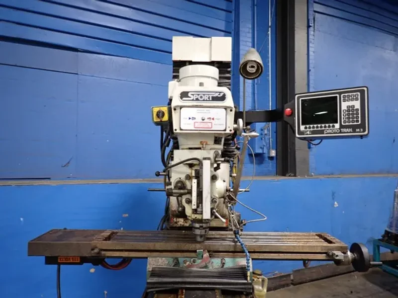 SOUTHWESTERN INDUSTRIES INC 10" X 50" CNC VERTICAL MILL  -  SB3