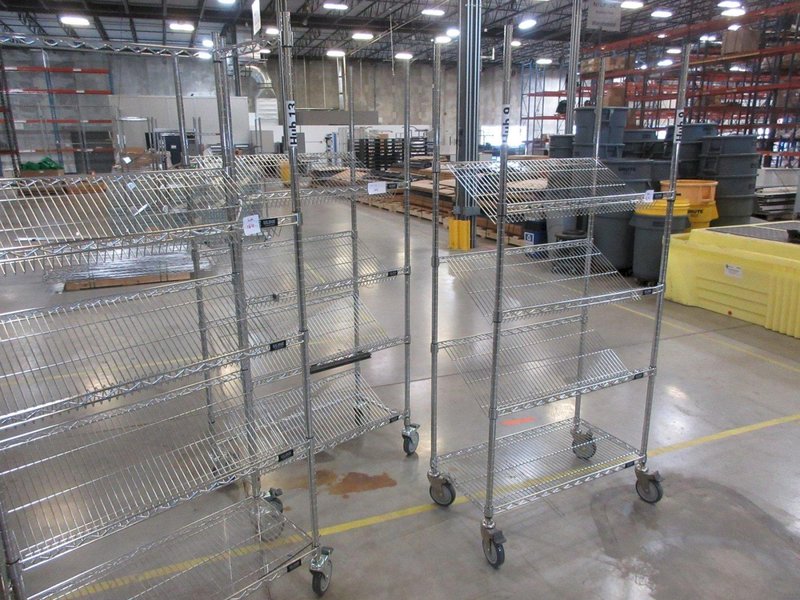 Uline Rolling Metal Wire Carts with Angled Shelves, (4) 36" x 18" x 78"- Auction Item