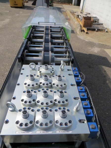 FRAMECAD System - Model F325iT - Produces Wall Frames, Trusses and Joists for Residential and Light Commercial Buildings