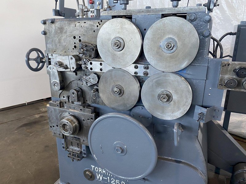 .250&quot; TORRINGTON #W125S SPRING COILER W/ TORSION ATTACHMENT. STOCK # 0526122