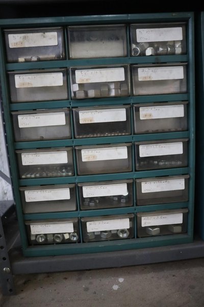Shelving Unit with (6) Multi-Bin Cabinets with Hardware and Fasteners Contents- Auction Item