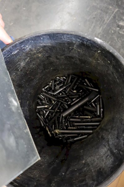 Scrap Carbide in Recyle Bin and 5 Gallon Pail, Approx 95 lbs- Auction Item