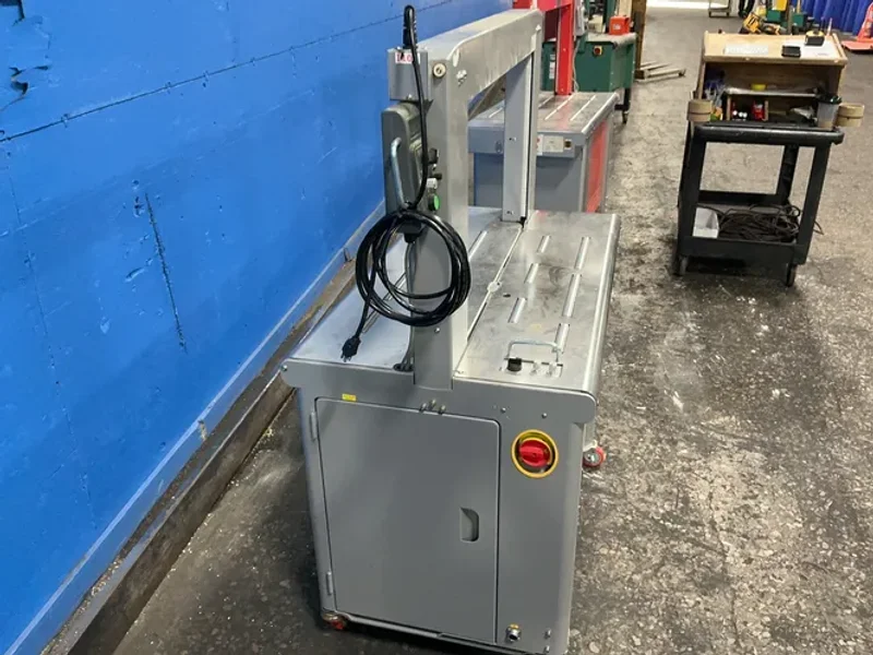 PAC STRAPPING PRODUCTS, INC. 25”X33.5” AUTOMATIC ARCH STRAPPING MACHINE  -  SM65