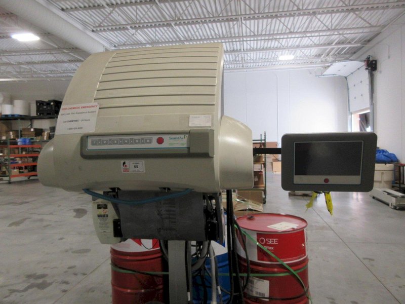Sealed Air SpeedyPacker Insight, Foam-In-Bag Packaging System, 19" Floor Model, with Drums of Chemicals and Accessories- Auction Item