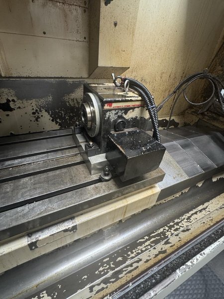 Okuma MC-V4020 VMC, 2005 – 4th Axis Rotary, Chip Conveyor