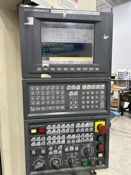 Okuma MC-V4020 VMC, 2005 – Chip Conveyor, 15,000 RPM 32 Slot Tool Changer