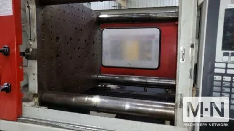 310 TON 36 OZ FERROMATIK MILACRON MODEL MT310-36 WIDE PLATEN INJECTION MOLDING MACHINE MFG 2001