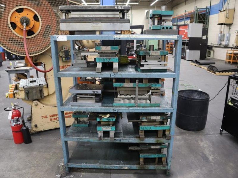 Press Dies on Steel Rack- Auction Item