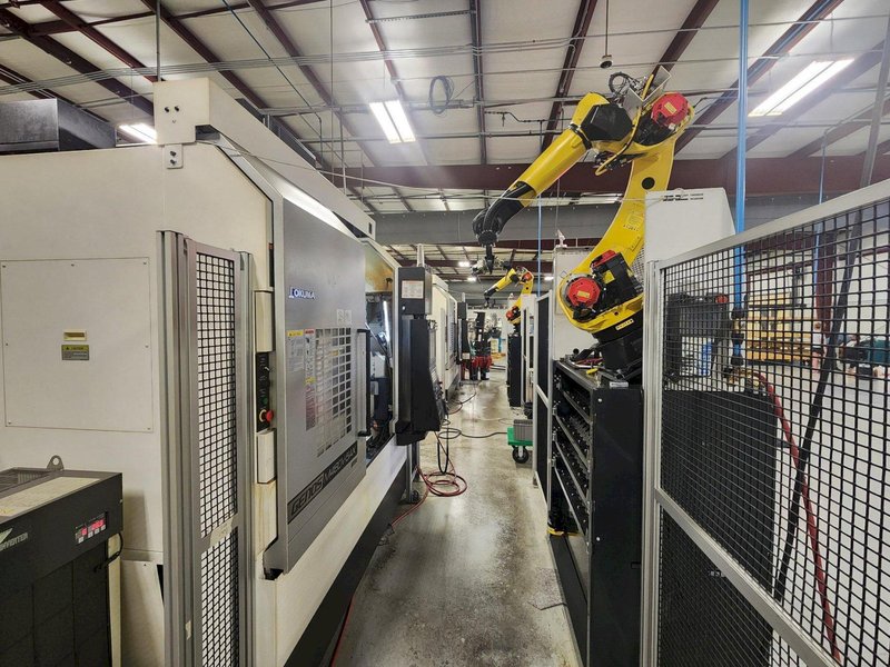 Okuma Genos M460V-5AX 5-Axis CNC VMC, 2021 – Robot Loader, Chip Conveyor, Mist Collector