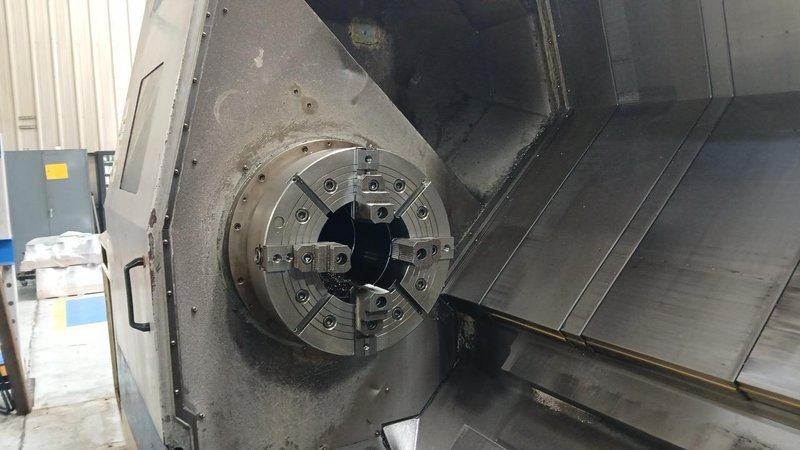 Doosan Puma 800L, 2007 – SMW Hyd Steady, 12″ Big Bore, Chip Conveyor