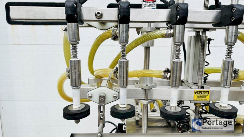 Inline Filling Systems  | Six-Headed Semi-Automatic  |  Overflow Filler
