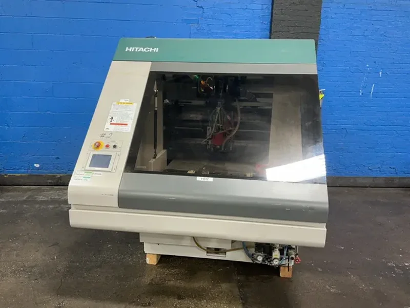 HITACHI 65” X 32” X2 “ NUMERICALLY CONTROLLED PRINTED-CIRCUIT BOARD DRILLING MACHINE   -  ND-1V264E