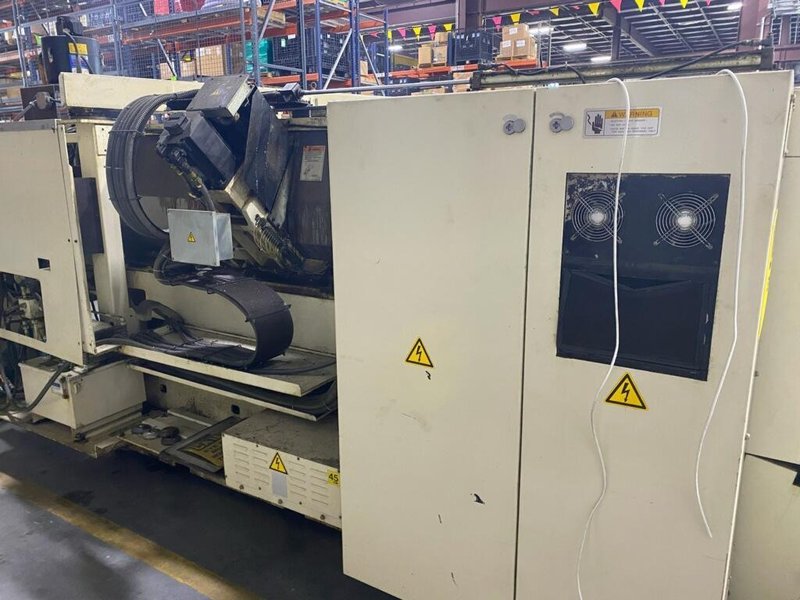 Okuma LU15 CNC Lathe, 2002 – Tailstock, Chip Conveyor