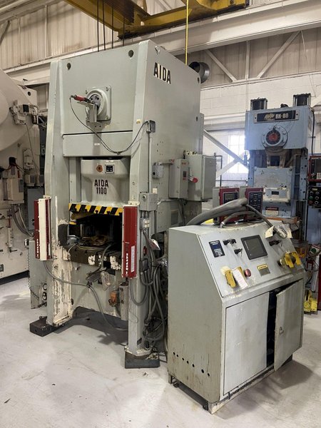121 ton Aida NS1-1100 Single Point Eccentric Geared Straight Side Mechanical Metal Stamping Press, New 2001