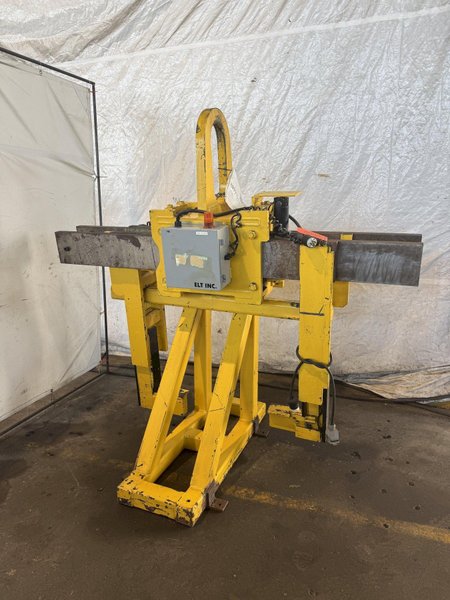 10,000 LBS ADJUSTABLE POWERED COIL GRABBER. STOCK # 0917219