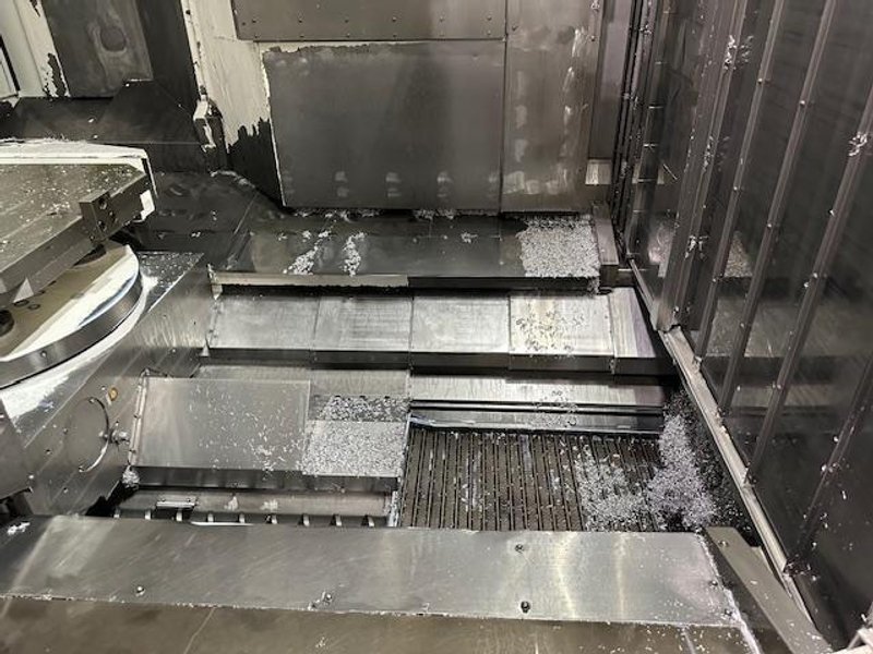 OKUMA MB8000H CNC HMC, 2017, equipped with OSP P300M CNC Ctrl., 12 pallets, 12,000 RPM, and robust automation features including 12 pallet cell configuration, shower coolant and Renishaw tool breakage detection and Renishaw Part Probe, 50 HP, New 2017