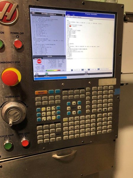 Haas VF-10/40 VMC 2017 with: Haas CNC Control, 4th Axis Drive and Wiring, Haas HRT210-2, 30+1 High Speed Mount Tool Changer, Programmable Coolant and Nozzle, Minimum Quantity Lubrication, Remote Jog Handle, Coolant Tank, and Chip Auger.