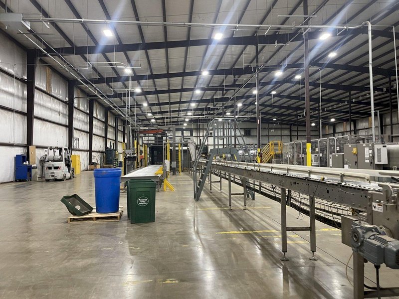 Complete End-of-Line Packaging System by Douglas/IPM for Bundling &amp; Palletizing Beverage Variety Packs