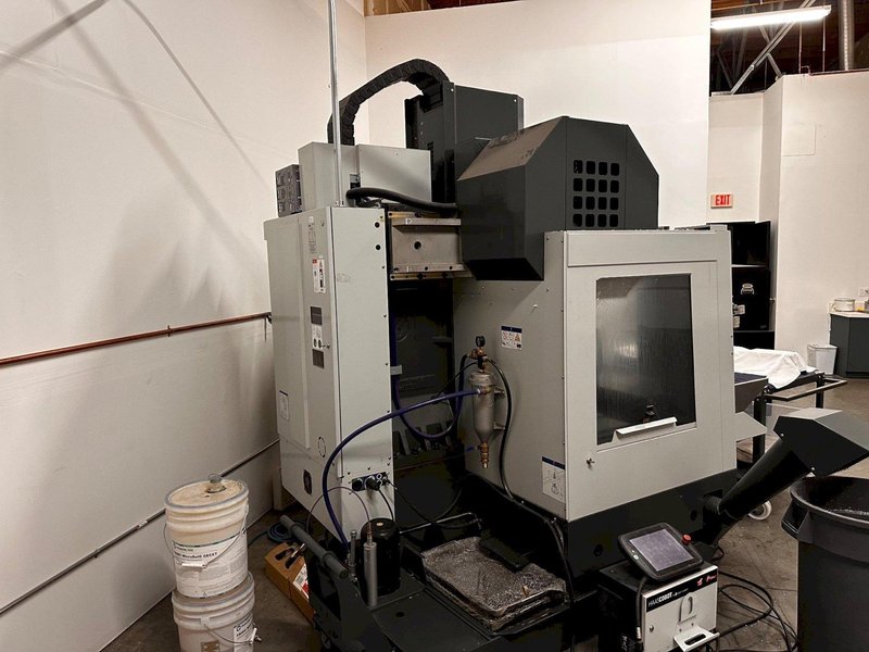 2024 HAAS VF-2SS with HC10 6-Axis Cobot with low hours. Vertical Machining Center
