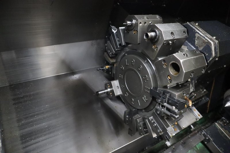 Doosan Lynx 300M CNC Turning Center with Live Milling, 12 Station Turret, 10&quot; 3-Jaw Chuck, Tailstock, Tool Presetter, Parts Catcher, Chip Conveyor- Auction Item