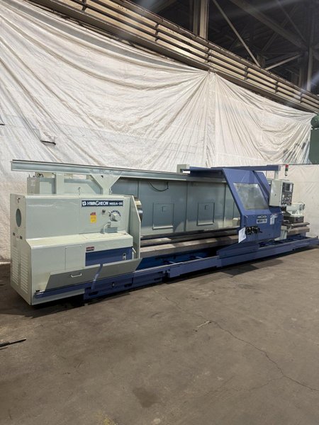 38.6" X 197" HWACHEON MEGATURN 95 CNC 9" HOLLOW SPINDLE OIL FIELD LATHE. STOCK # 0882125