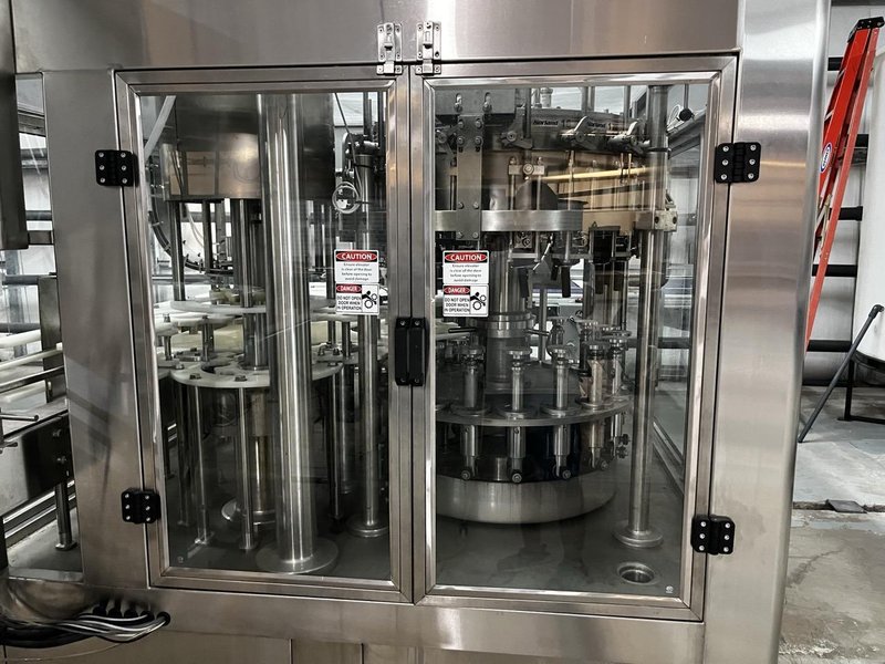 Norland International Complete line with (2) GlassPak66 Monoblock Systems (16oz and 25 Oz)  for Glass or Aluminum with Fluid Solutions 3 Head ROPP Capper, 2020: