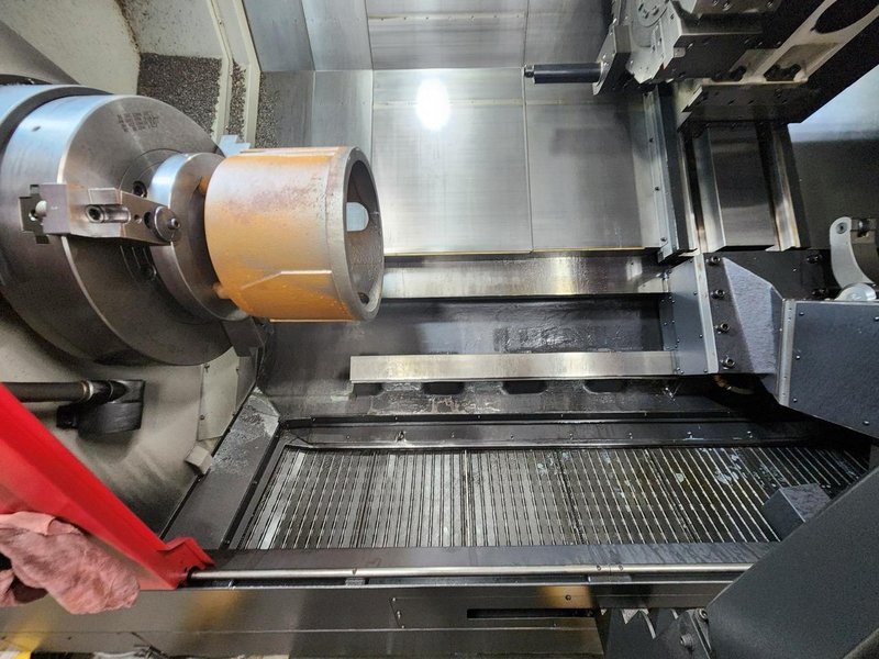 Smart NL6000LM CNC Lathe, 2023 – 24″ Chuck, Live Tooling, Tailstock, Steady Rest, Box Ways, Chip Conveyor