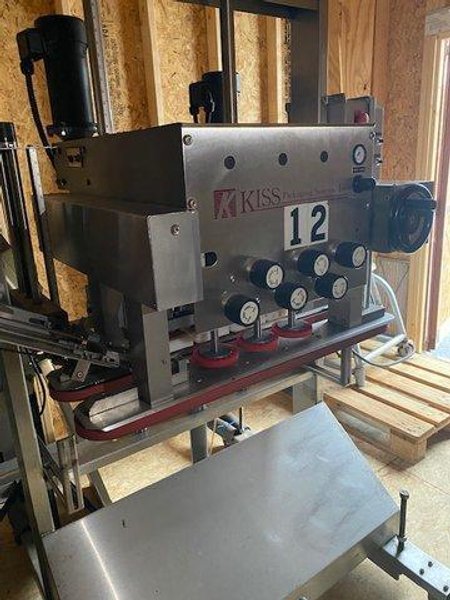 Kiss Packaging Systems Spindle Capper with Hoppmann feeder and 12′ Conveyor