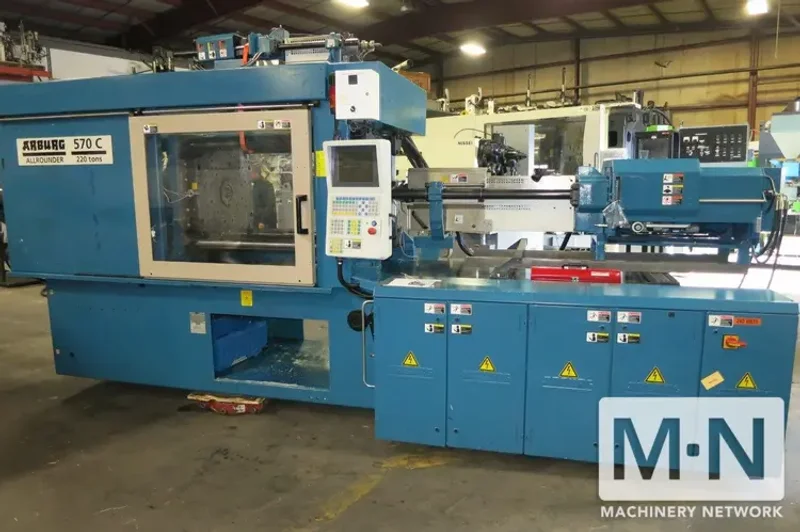 220 TON 6.2 OZ /0.6 OZ ARBURG MODEL 2-COLOR 570C2000-800/60 INJECTION MOLDING  MFG 2005