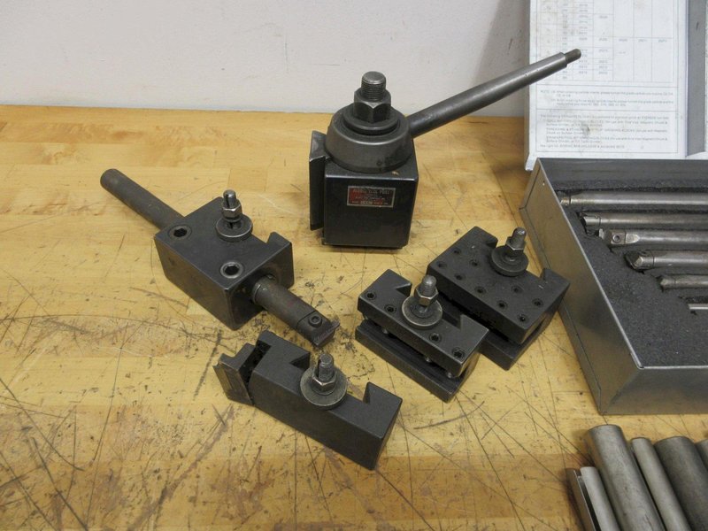 Aloris CXA Tool Post and (4) Assorted Holders, with Everede Tool Co. Boring Bar Set with Sleeves and Cutting Inserts- Auction Item