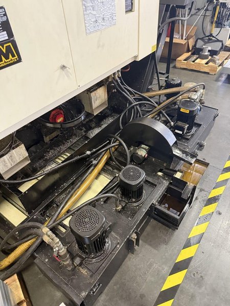YCM NXV560A-APC VMC, 2015 – Chip Conveyor, Fanuc Control, 12K RPM