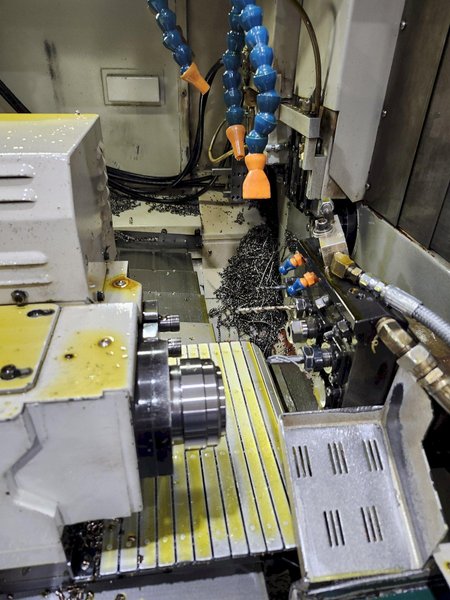 Nexturn SA-38 CNC Swiss Lathe, 38mm, 7-Axis, Turning Length: 8.3", 13 Tools, C-Axis, 8000 RPM, Fanuc 18i-TB, High Press. Coolant, Fire Suppression, Mag. Barfeeder, New 2006