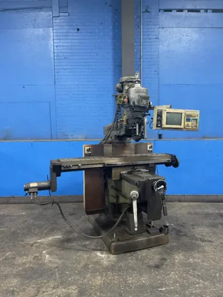 BRIDGEPORT 58” X 11” CNC VERTICAL MILL