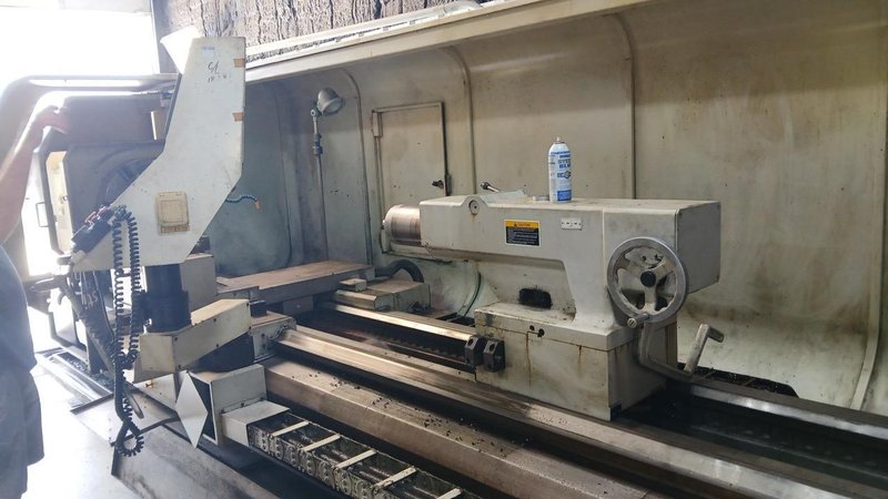 37.4″ x 156″ Hankook Protec 9NC 10″ Spindle Bore, Dual Chucks, 2006 – Chip Conveyor, 8 Station Turret