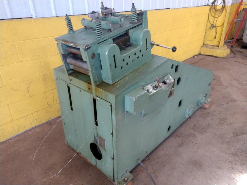 9.8" X .059" AIDA MODEL #LM-2532 9 ROLL POWERED COIL STRIP STRAIGHTENER: STOCK 14441