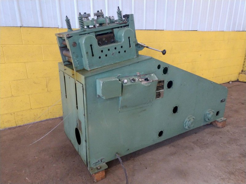 9.8" X .059" AIDA MODEL #LM-2532 9 ROLL POWERED COIL STRIP STRAIGHTENER: STOCK 14441