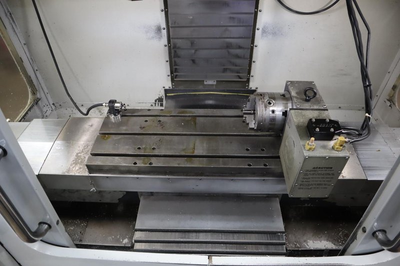 Haas VF-2SS CNC Vertical Machining Center, 12K Spindle, 4th Axis Brushless Drive with SHRT-160H Rotary Table, 24 Station SMTC, Probing, Chip Auger - Auction Item