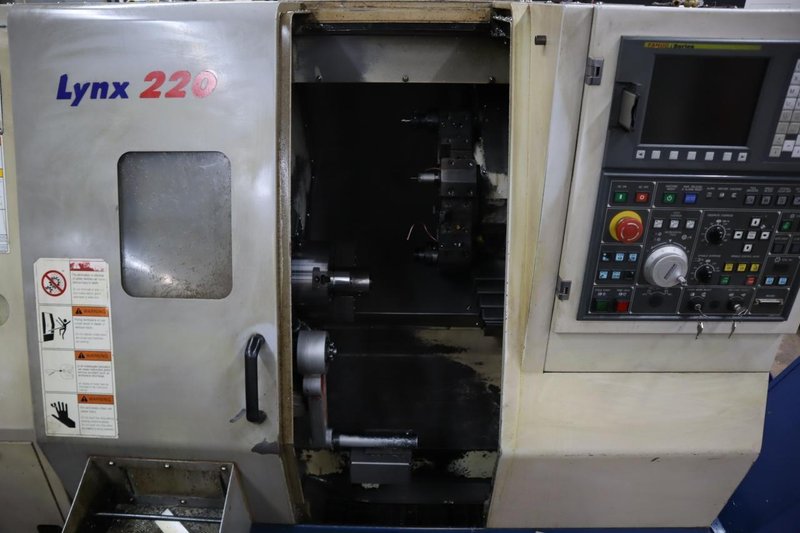 Daewoo Doosan Lynx 220C CNC Turning Center, 8" 3-Jaw Chuck, 12 Station Turret, Parts Catcher, Tool Presetter, Chip Conveyor- Auction Item