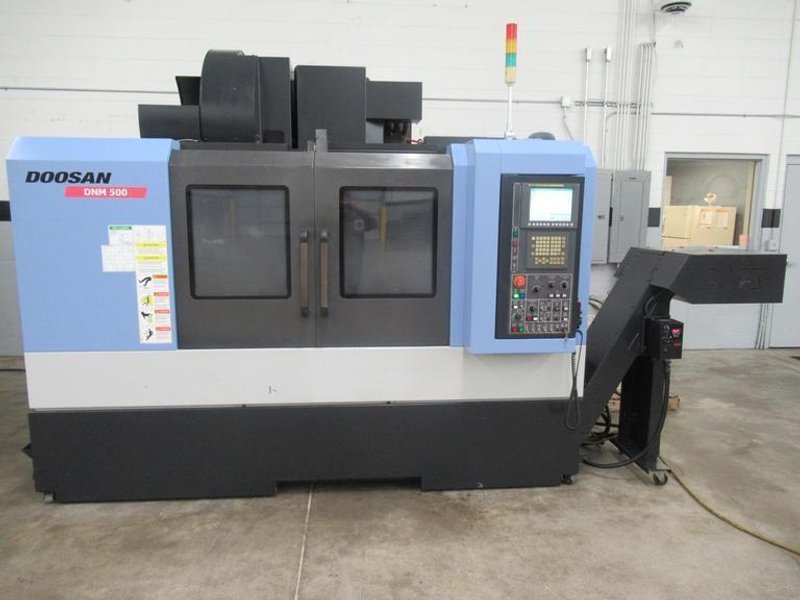 Doosan DNM 500 CNC Vertical Machining Center, 12K RPM Spindle, High Pressure Coolant, Renishaw Probing, Full 4th Axis, Chip Conveyor