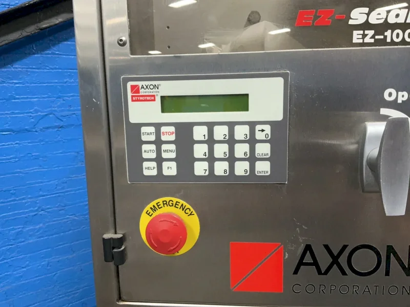 AXON CORPORATION SEALING MACHINE   -  EZ-100