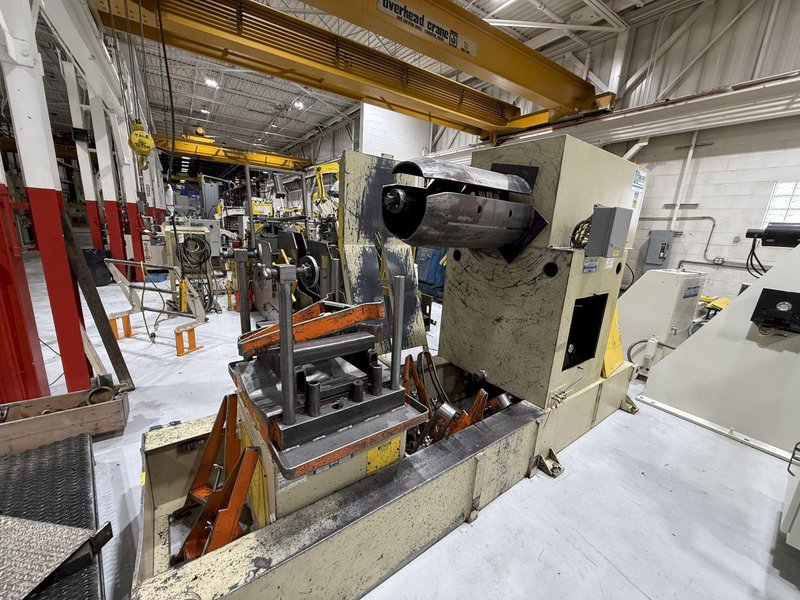 10,000 lbs. x 24&quot; Dallas Motorized Coil Reel with Car and Peeler, Threader and Hold Down Station, Year 1995