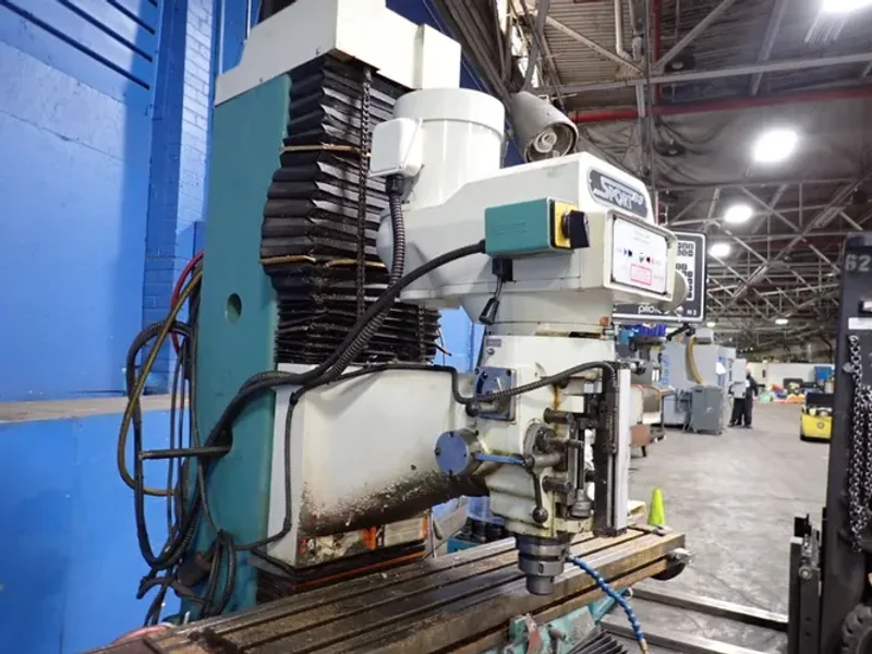 SOUTHWESTERN INDUSTRIES INC 10" X 50" CNC VERTICAL MILL  -  SB3